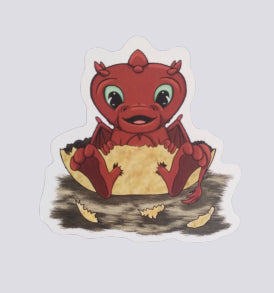 Magnet de elsa abadie penars dessin numérique représentant un bébé dragon sortant de la coquille de son œuf